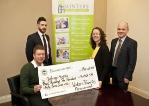 Fiona Mc Kinnon, fundraising coordinator with Galway Hospice, accepts a cheque for €3,653 from Peter Nicklin, Niall Usher and Ronan Mc Guire, property managers at Winters Property Management, Liosbán, funds raised by The Winters Property Sports and Social Club, who raised €3653.55 for the charity from a sponsored climb of Diamond mountain in Connemara last October. Photo: Galway Focus